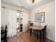 Cozy dining area with hardwood floors, table with seating, and a sliding glass door leading to the patio at 312 Kelsey Blvd, Wando, SC 29492