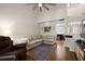 Spacious living room with hardwood floors, ceiling fan, and natural light at 312 Kelsey Blvd, Wando, SC 29492