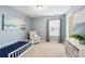 Calm bedroom with soft blue walls and comfortable furniture at 3274 Arrow Arum Dr, Johns Island, SC 29455