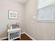 Charming coffee nook featuring a small white table and decorative sign near a window at 3274 Arrow Arum Dr, Johns Island, SC 29455