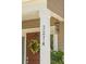 Inviting front porch with address numbers, a lemon wreath on the door, and decorative accents at 3274 Arrow Arum Dr, Johns Island, SC 29455