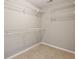 Spacious walk-in closet with wire shelving and neutral carpeting at 3274 Arrow Arum Dr, Johns Island, SC 29455