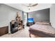 Gray bedroom with ceiling fan, window, and television at 331 Saddlewood Dr, Charleston, SC 29414