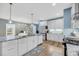Bright kitchen features white cabinets, stainless steel appliances, and gray marble countertops at 331 Saddlewood Dr, Charleston, SC 29414