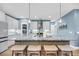 Spacious kitchen island featuring stone countertops, wooden accents, pendant lighting, and barstool seating at 331 Saddlewood Dr, Charleston, SC 29414