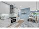 Modern kitchen with white cabinetry, stainless steel appliances, and elegant stone countertops at 331 Saddlewood Dr, Charleston, SC 29414
