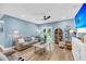 Comfortable living room offers plenty of natural light and a sliding glass door to the backyard at 331 Saddlewood Dr, Charleston, SC 29414