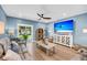 Comfortable living room offers plenty of natural light and a sliding glass door to the backyard at 331 Saddlewood Dr, Charleston, SC 29414