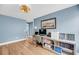 Home office featuring a desk, chair, shelving unit, and a window providing natural light, ideal for work at 331 Saddlewood Dr, Charleston, SC 29414