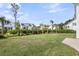 Spacious backyard with lush lawn, neatly trimmed shrubs, and mature trees, offering privacy at 3769 Summerton St, Mount Pleasant, SC 29466