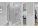 Modern bathroom with glass shower, white subway tile, and doorway to bedroom at 3769 Summerton St, Mount Pleasant, SC 29466
