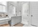 Bathroom features vanity, marble floors, and separate room for toilet at 3769 Summerton St, Mount Pleasant, SC 29466