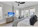 Bedroom featuring a four poster bed, ceiling fan, and a television above a dresser at 3769 Summerton St, Mount Pleasant, SC 29466
