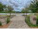 Bolden Park entrance with a tranquil lake view and inviting benches for relaxation at 3769 Summerton St, Mount Pleasant, SC 29466