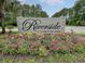 Welcoming sign for Riverside at Carolina Park surrounded by colorful flowers at 3769 Summerton St, Mount Pleasant, SC 29466
