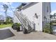 Charming home exterior featuring a side entrance with well-maintained landscaping and a backyard patio at 3769 Summerton St, Mount Pleasant, SC 29466
