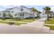 Picturesque curb appeal of a two-story home with a charming porch and beautiful landscaping at 3769 Summerton St, Mount Pleasant, SC 29466