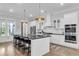 Kitchen area featuring a kitchen island with black granite countertop and stainless steel appliances at 3769 Summerton St, Mount Pleasant, SC 29466