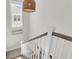 Staircase with view of window, light fixture, and landing at 3769 Summerton St, Mount Pleasant, SC 29466
