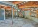Unfinished basement, featuring exposed beams and ample space for a variety of uses at 395 Summerset Ln, Summerville, SC 29483