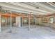 Spacious unfinished basement with concrete floors and block walls, ready for customization at 395 Summerset Ln, Summerville, SC 29483
