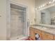 Bathroom featuring tiled shower, vanity with storage and countertop, and recessed lighting at 395 Summerset Ln, Summerville, SC 29483