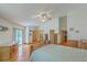 Spacious main bedroom with hardwood floors, ample closet space, and access to outdoor balcony at 395 Summerset Ln, Summerville, SC 29483