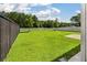 Spacious backyard surrounded by white and dark wood fencing at 425 W Respite Ln, Summerville, SC 29483
