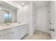 Bathroom with double vanity, white cabinets, and a large mirror, offering ample space at 425 W Respite Ln, Summerville, SC 29483
