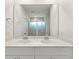 Bathroom vanity with double sinks, white countertop, and chrome fixtures at 425 W Respite Ln, Summerville, SC 29483