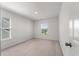 Neutral bedroom with carpet, window with blinds, and white walls at 425 W Respite Ln, Summerville, SC 29483