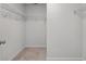 Walk-in closet featuring built-in shelving, providing ample storage space at 425 W Respite Ln, Summerville, SC 29483