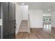 Bright entryway with hardwood floors and staircase with neutral carpeting at 425 W Respite Ln, Summerville, SC 29483