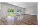 Bright living room featuring hardwood floors, large windows, and backyard access at 425 W Respite Ln, Summerville, SC 29483