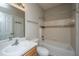Neutral bathroom featuring a vanity, tub, and shower with tiled walls at 45 Scyamore Ave # 623, Charleston, SC 29407