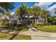 Charming single story home with a walkway and landscaped yard with palm trees at 45 Scyamore Ave # 623, Charleston, SC 29407