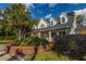 Charming two-story home with dormer windows and mature trees and landscaping at 45 Scyamore Ave # 623, Charleston, SC 29407