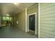 Hallway with a doormat, unit number, and access to stairs at 45 Scyamore Ave # 623, Charleston, SC 29407