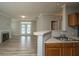 Open-concept living area with a fireplace and access to the patio, seamlessly connecting indoor and outdoor spaces at 45 Scyamore Ave # 623, Charleston, SC 29407