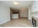 Spacious living room with modern light fixtures and hardwood floors at 45 Scyamore Ave # 623, Charleston, SC 29407