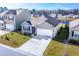 Charming single-Gathering home with a well-manicured lawn and a two-car garage at 5000 Paddy Field Way, Ladson, SC 29456