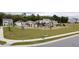 Community playground with swings, slide and picnic area surrounded by residential homes at 5000 Paddy Field Way, Ladson, SC 29456