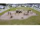 Community playground with swings, slide and benches in a Gathering-friendly neighborhood at 5000 Paddy Field Way, Ladson, SC 29456