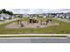 Community playground with swings, slide, and picnic area in Gathering-friendly neighborhood at 5000 Paddy Field Way, Ladson, SC 29456