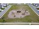 Overhead view of a community playground with green space and soccer field near neighborhood at 5000 Paddy Field Way, Ladson, SC 29456
