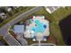 Aerial shot of the community pool featuring a modern layout with clubhouse and parking at 5000 Paddy Field Way, Ladson, SC 29456
