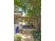 Charming covered back patio with outdoor dining and lounging area perfect for enjoying the backyard at 5010 Converse St, North Charleston, SC 29405