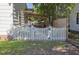 Cozy backyard with a charming white picket fence and an inviting covered pergola at 5010 Converse St, North Charleston, SC 29405