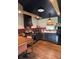 Stylish kitchen with stainless steel appliances, dark cabinets, and dining table and chairs at 5010 Converse St, North Charleston, SC 29405
