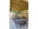 Pergola featuring a dining table, lounge chairs, and overhead string lights at 5010 Converse St, North Charleston, SC 29405